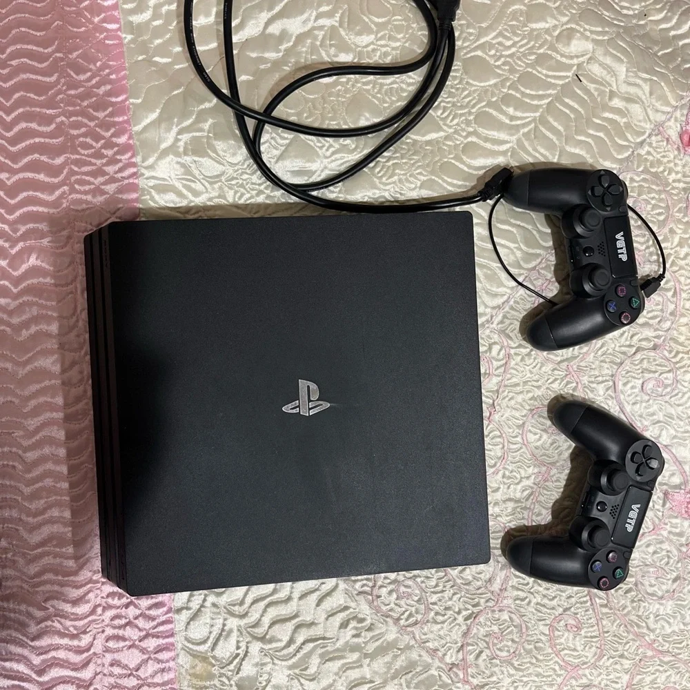Sony PS4 Pro Console with DualShock Controllers - Black